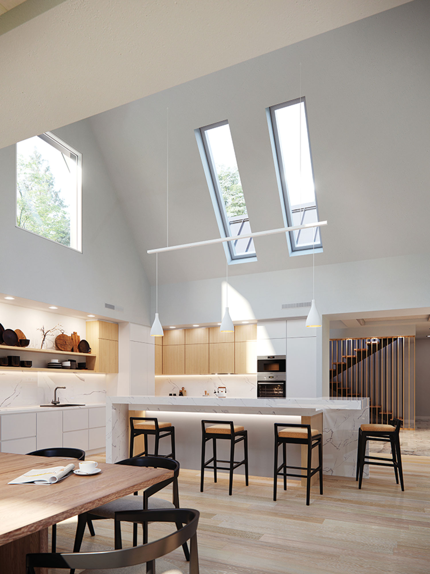 Two narrow and long, modern skylights in a sloped ceiling above a kitchen