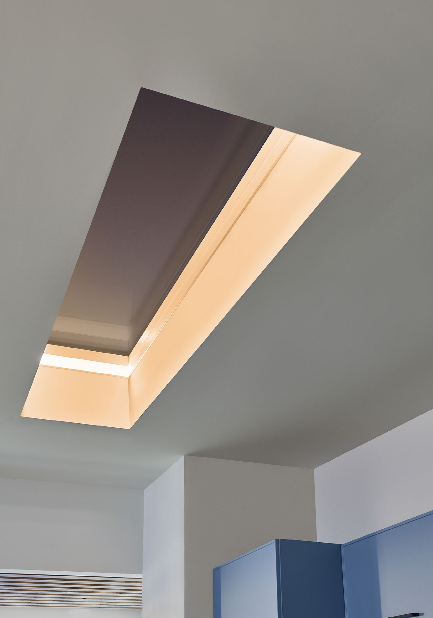 A recessed skylight with lighting within the border