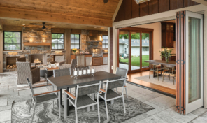 Porch sliding doors adjacent to an open-concept dining and living space