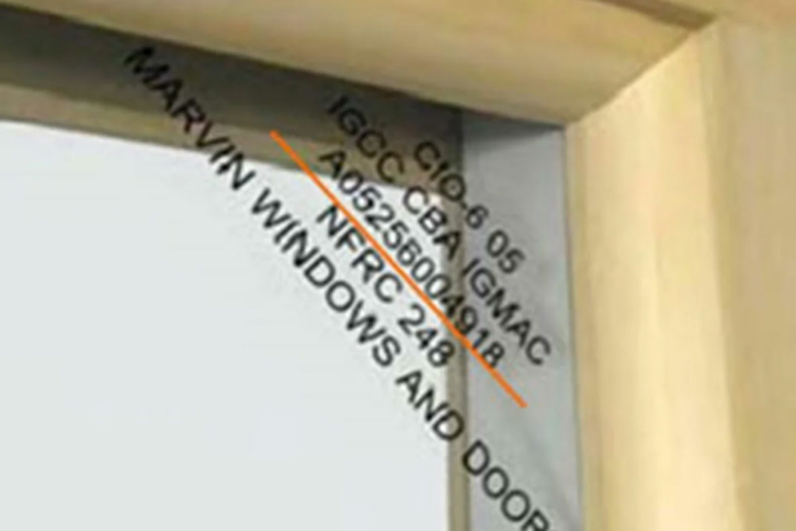 A Marvin Window etching of identifying numbers found in the corner.