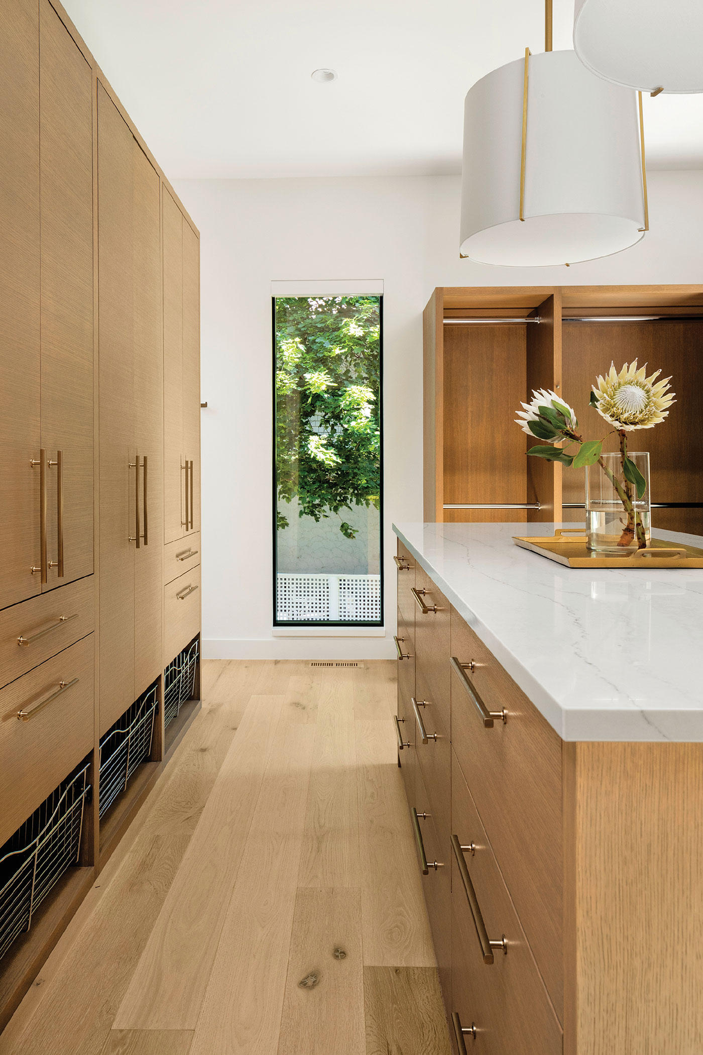 A modern kitchen with long island